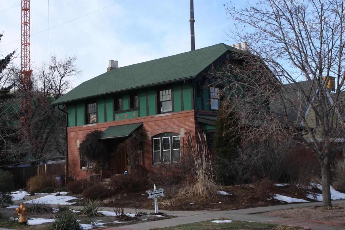 a house with trees in the background