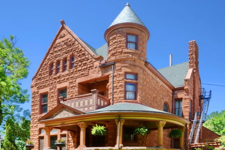 a church with a clock on the side of a building