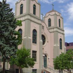 a large clock tower in front of a building