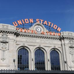 a large building in the background with Union Station in the background
