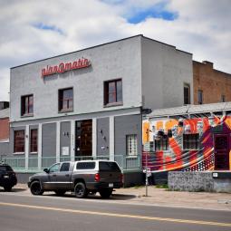 a car parked in front of a building