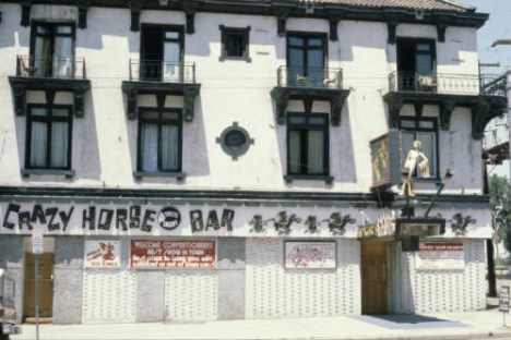 a group of people in front of a building