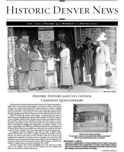 a group of people standing in front of a newspaper
