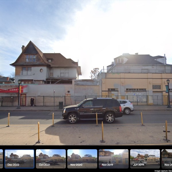 a sign on the side of a road