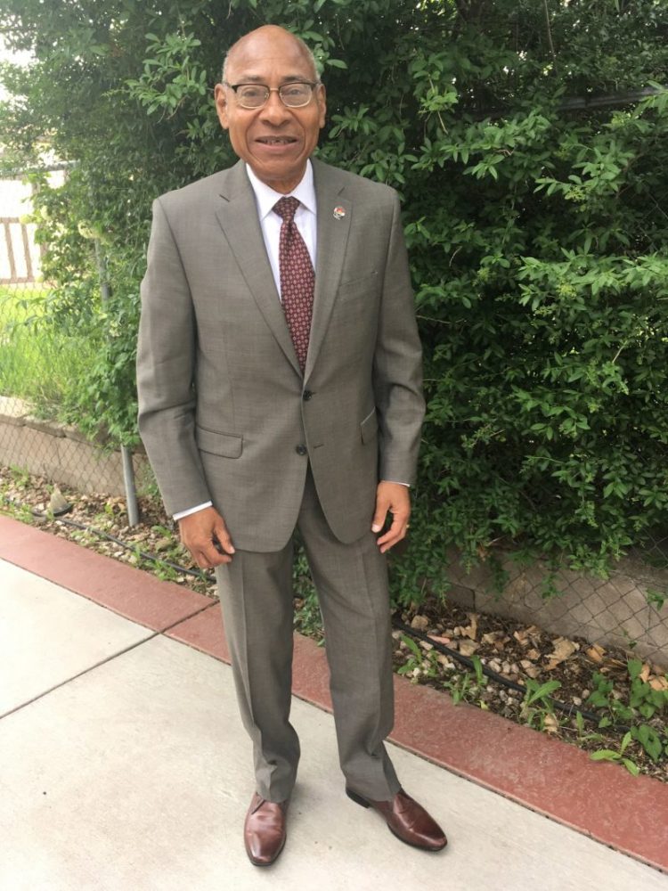 a man wearing a suit and tie