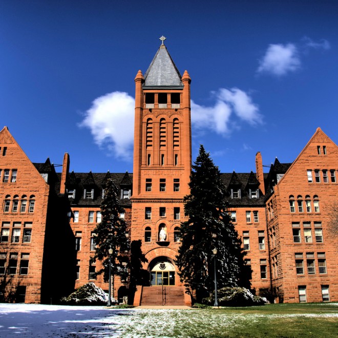 a large brick building with a clock tower