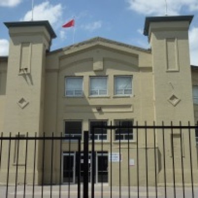 a group of people in front of a building