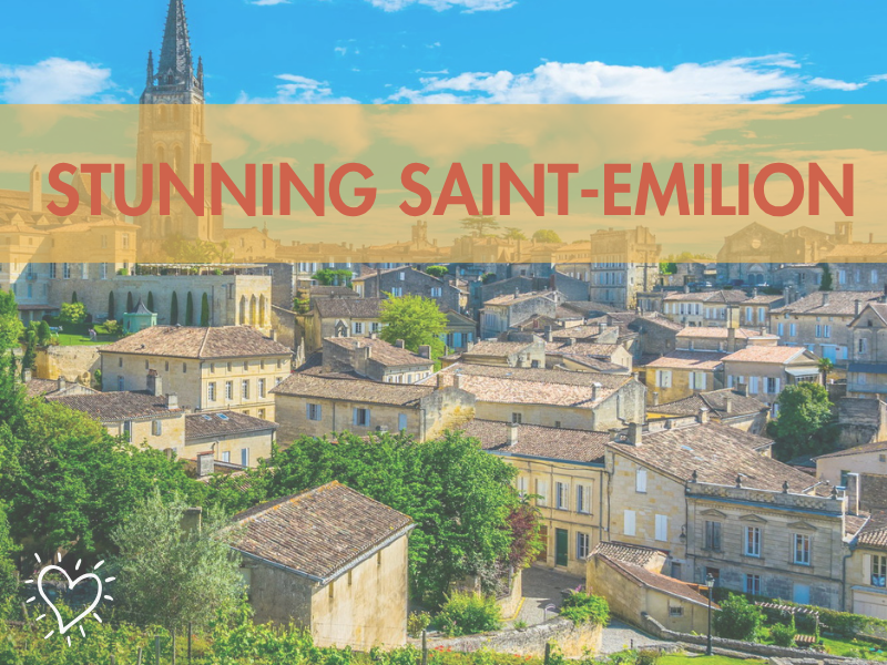 Scenic view of Saint-Emilion with historic buildings and the text 'Stunning Saint-Emilion' overlaid.